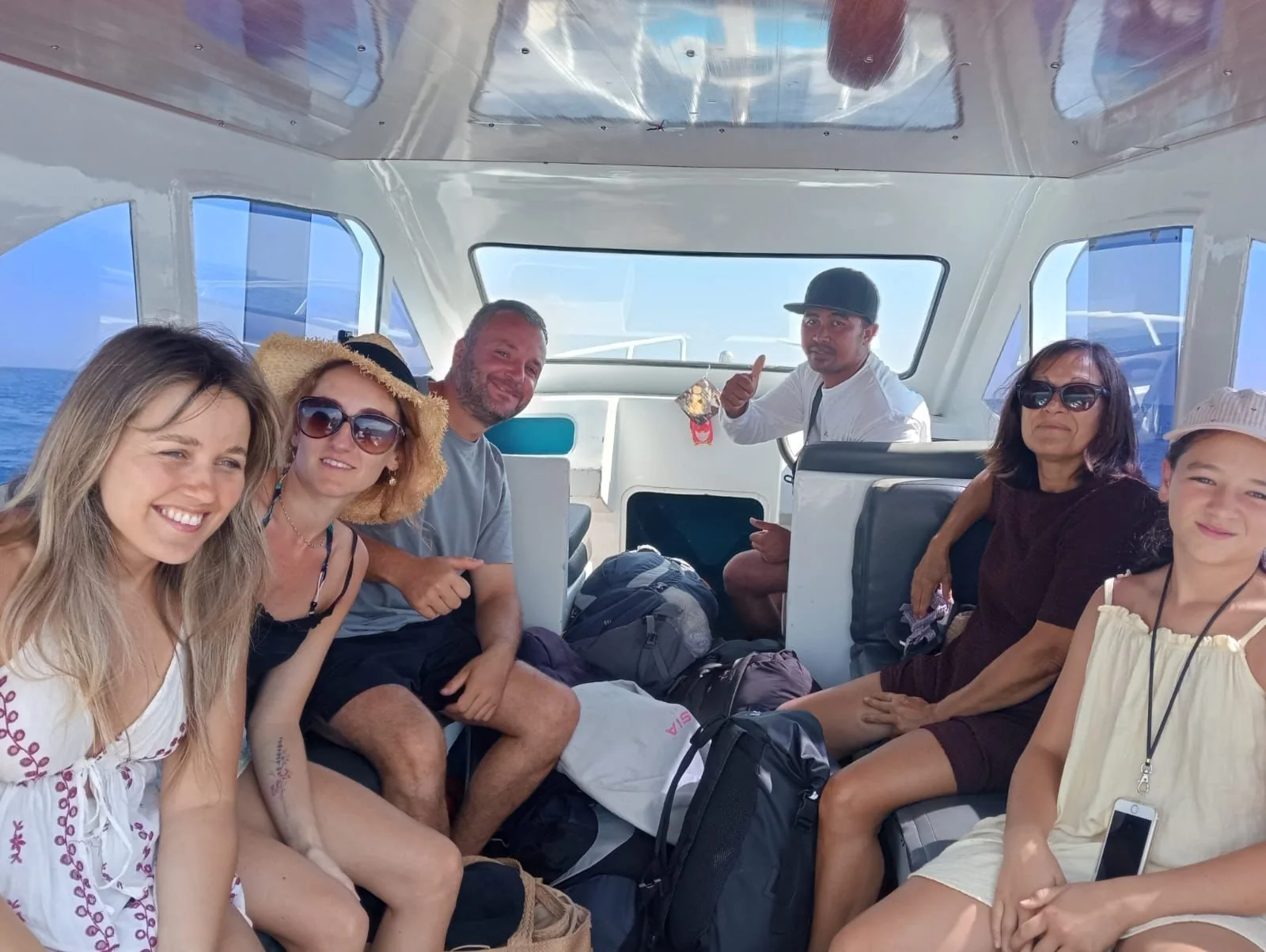 Guests travelling by private boat from Teluk Nare Harbour